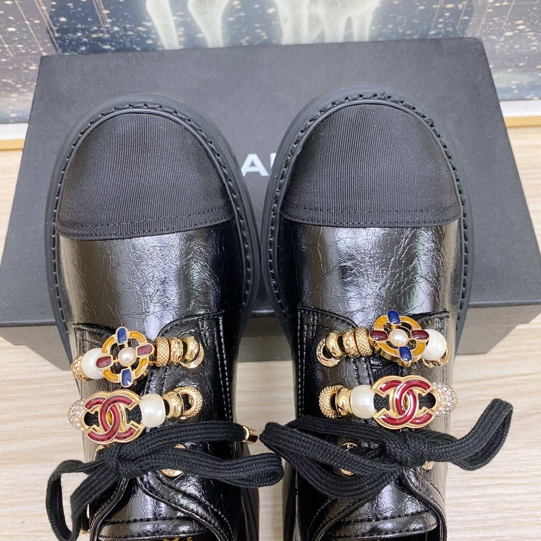 CHANEL COMBAT OXFORD SHOES IN BLACK WRINKLED CALFSKIN AND GROSGRAIN WITH FAUX PEARL