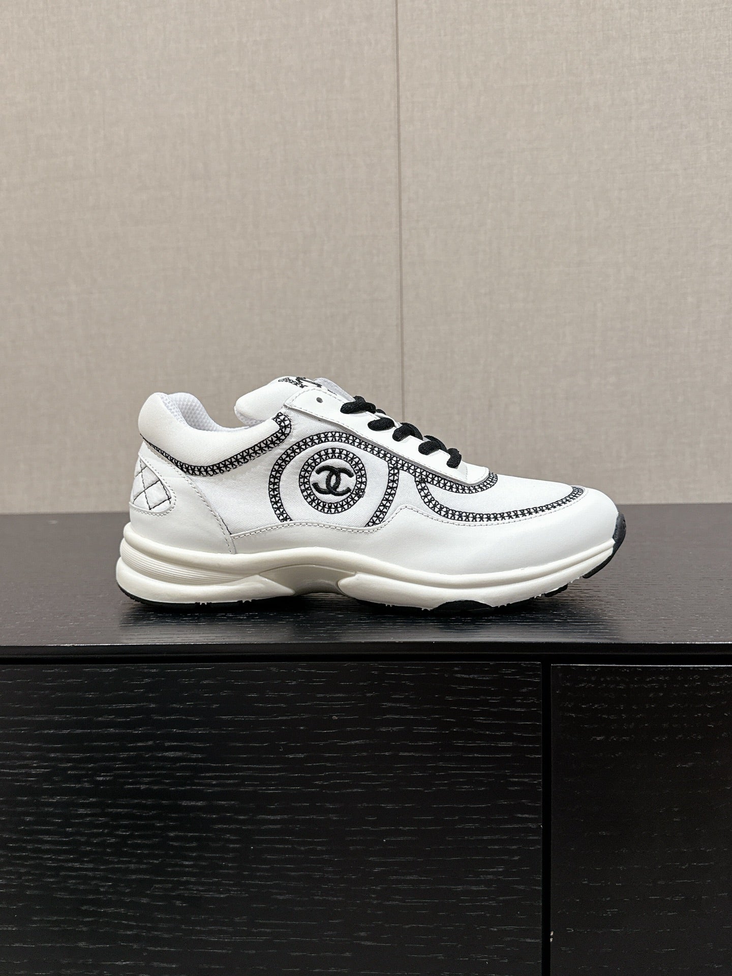 CHANEL CLASSIC TRAINER IN WHITE MIX BLACK FABRIC