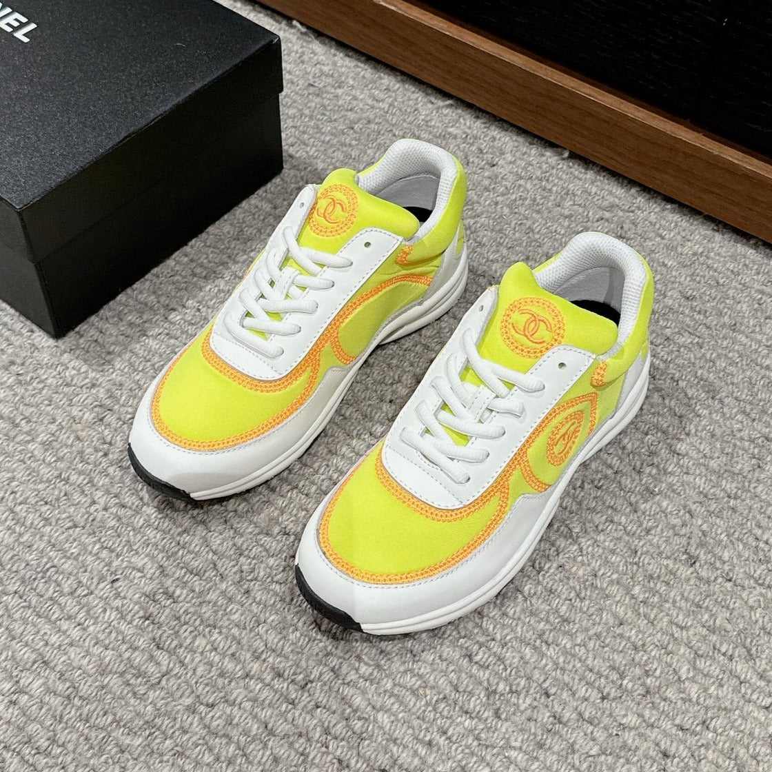 CHANEL CLASSIC TRAINER IN YELLOW MIX WHITE FABRIC