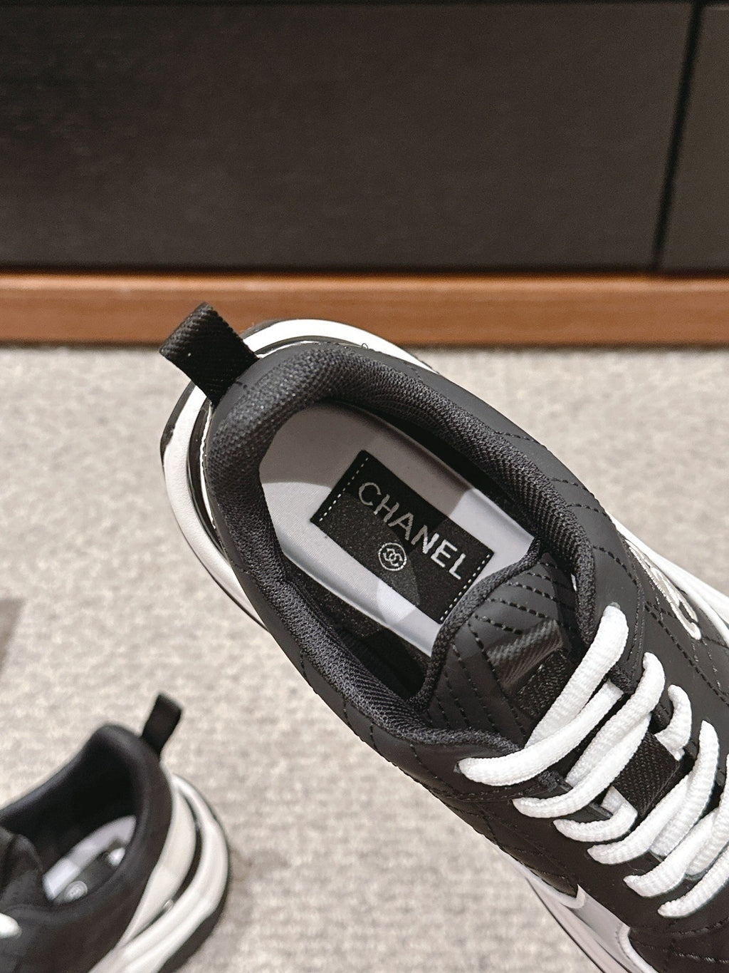 CHANEL CLASSIC SNEAKER IN BLACK MIX WHITE LAMBSKIN