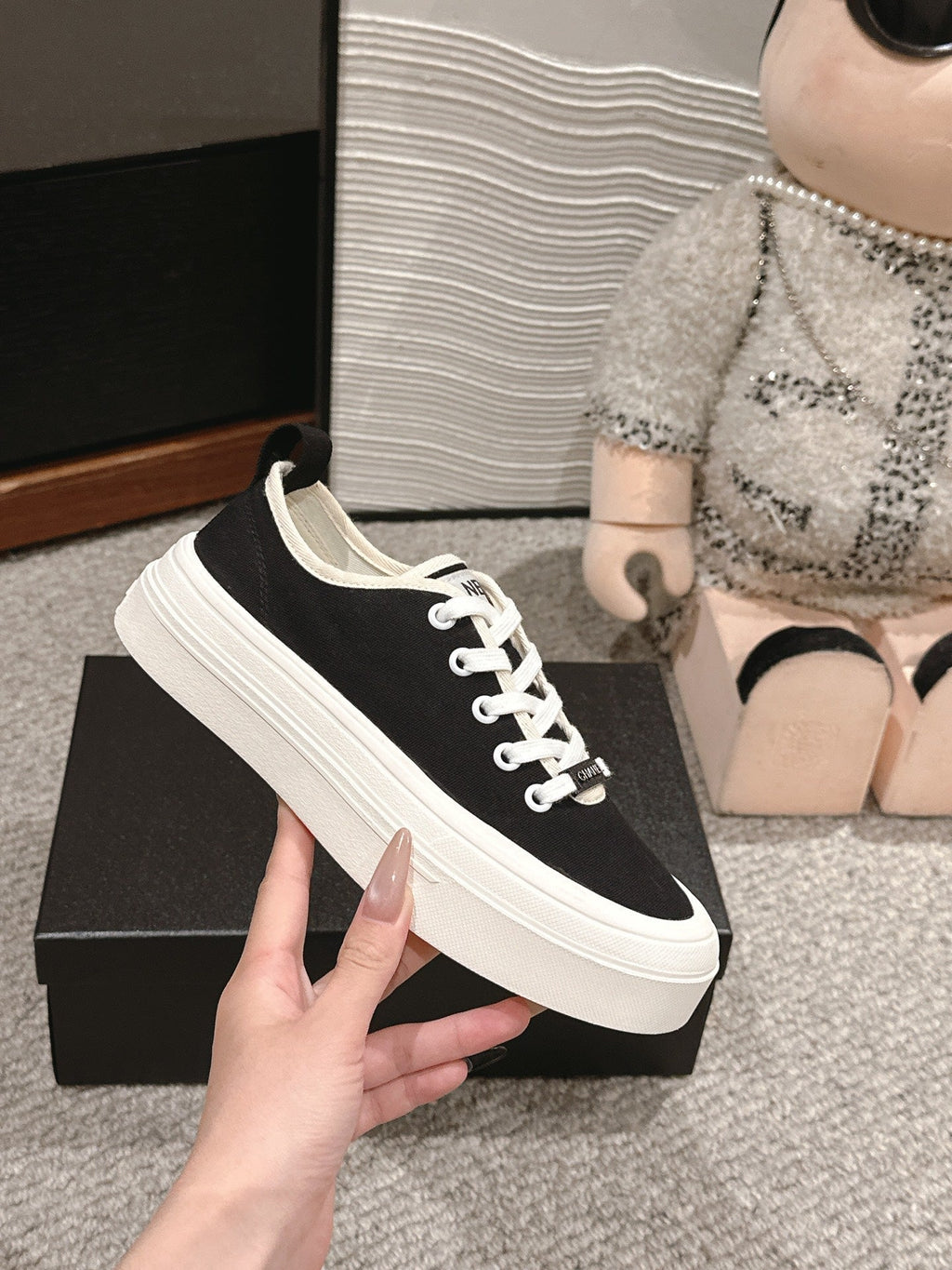 CHANEL LACE-UP SNEAKERS IN BLACK CANVAS