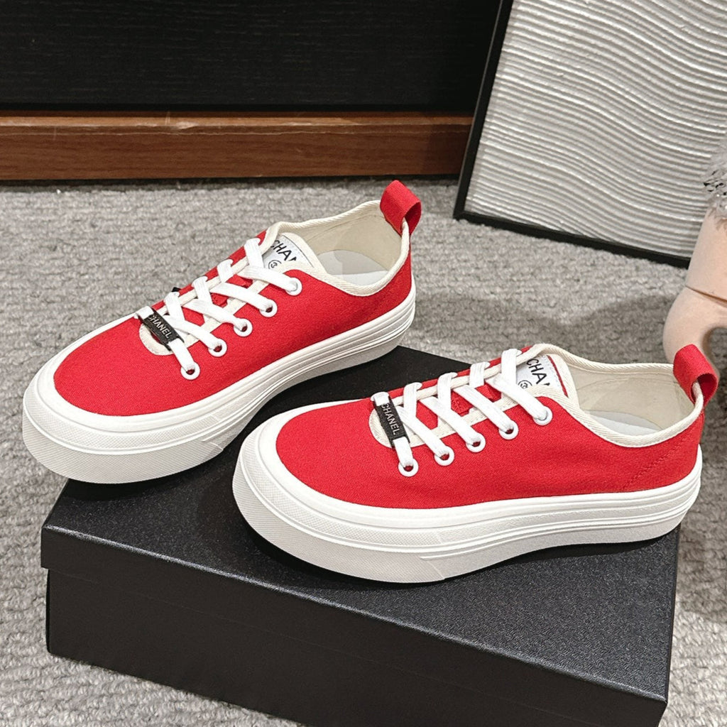 CHANEL LACE-UP SNEAKERS IN CHERRY RED CANVAS