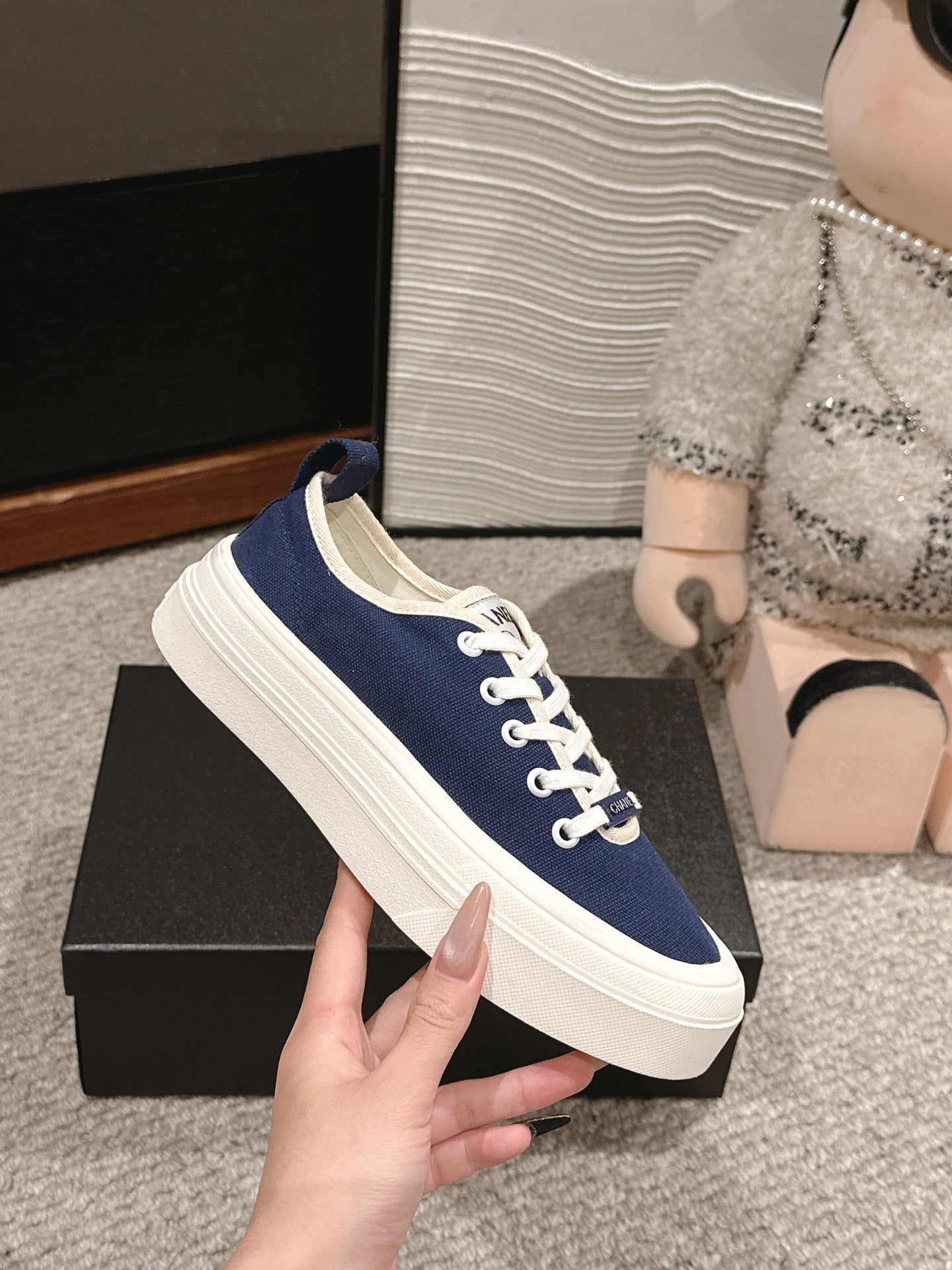 CHANEL LACE-UP SNEAKERS IN NAVY BLUE CANVAS