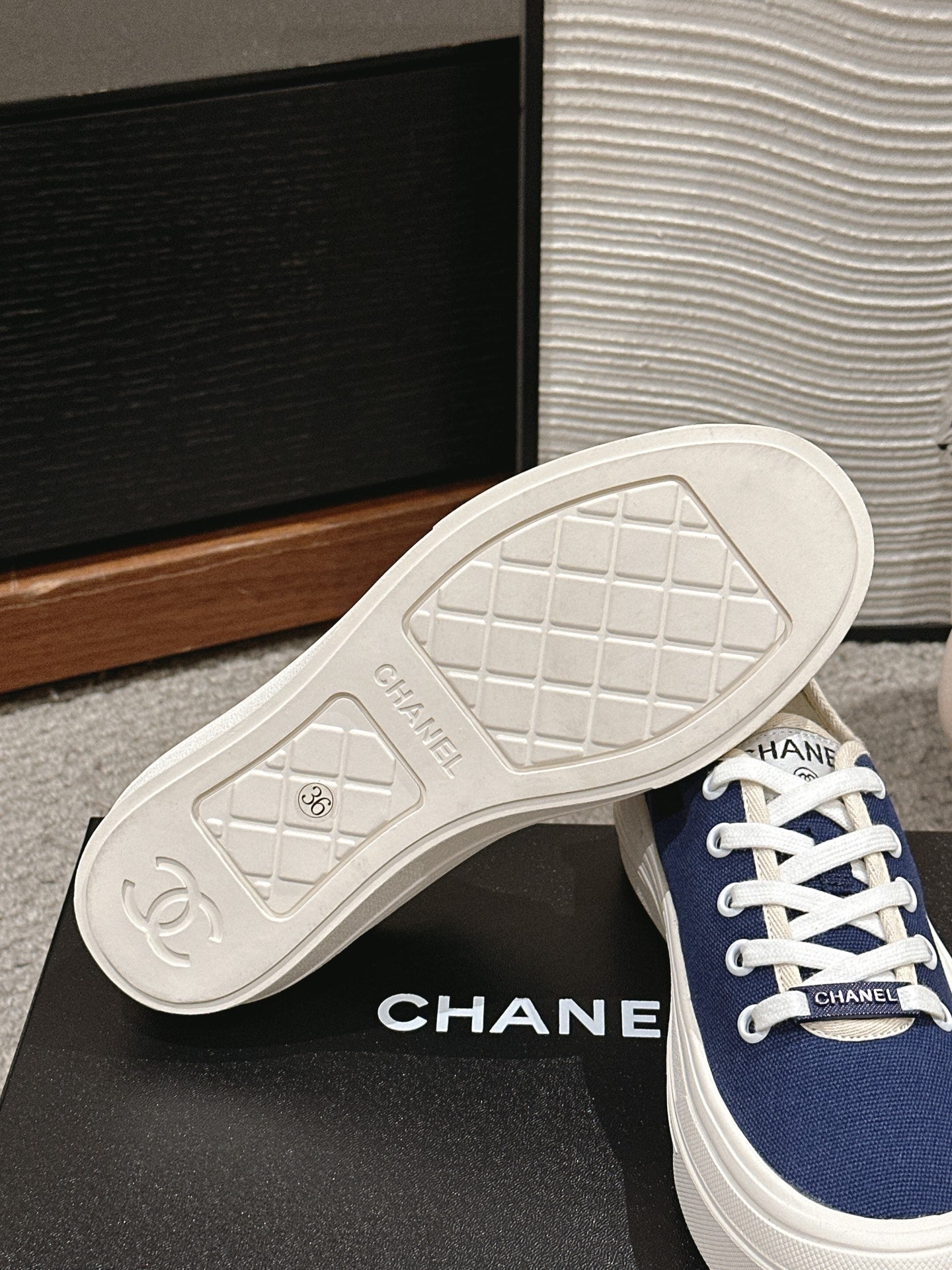 CHANEL LACE-UP SNEAKERS IN NAVY BLUE CANVAS
