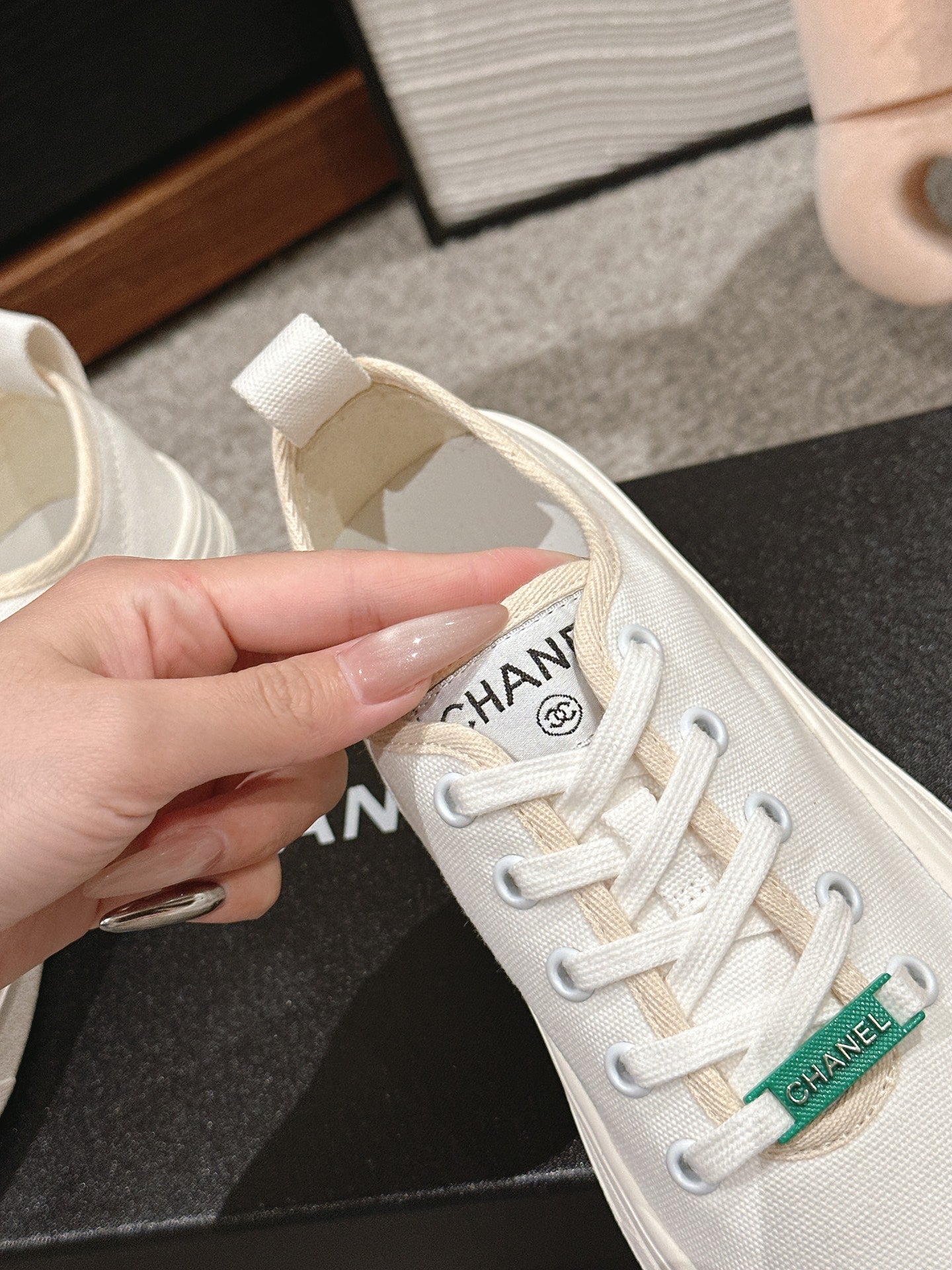 CHANEL LACE-UP SNEAKERS IN WHITE CANVAS
