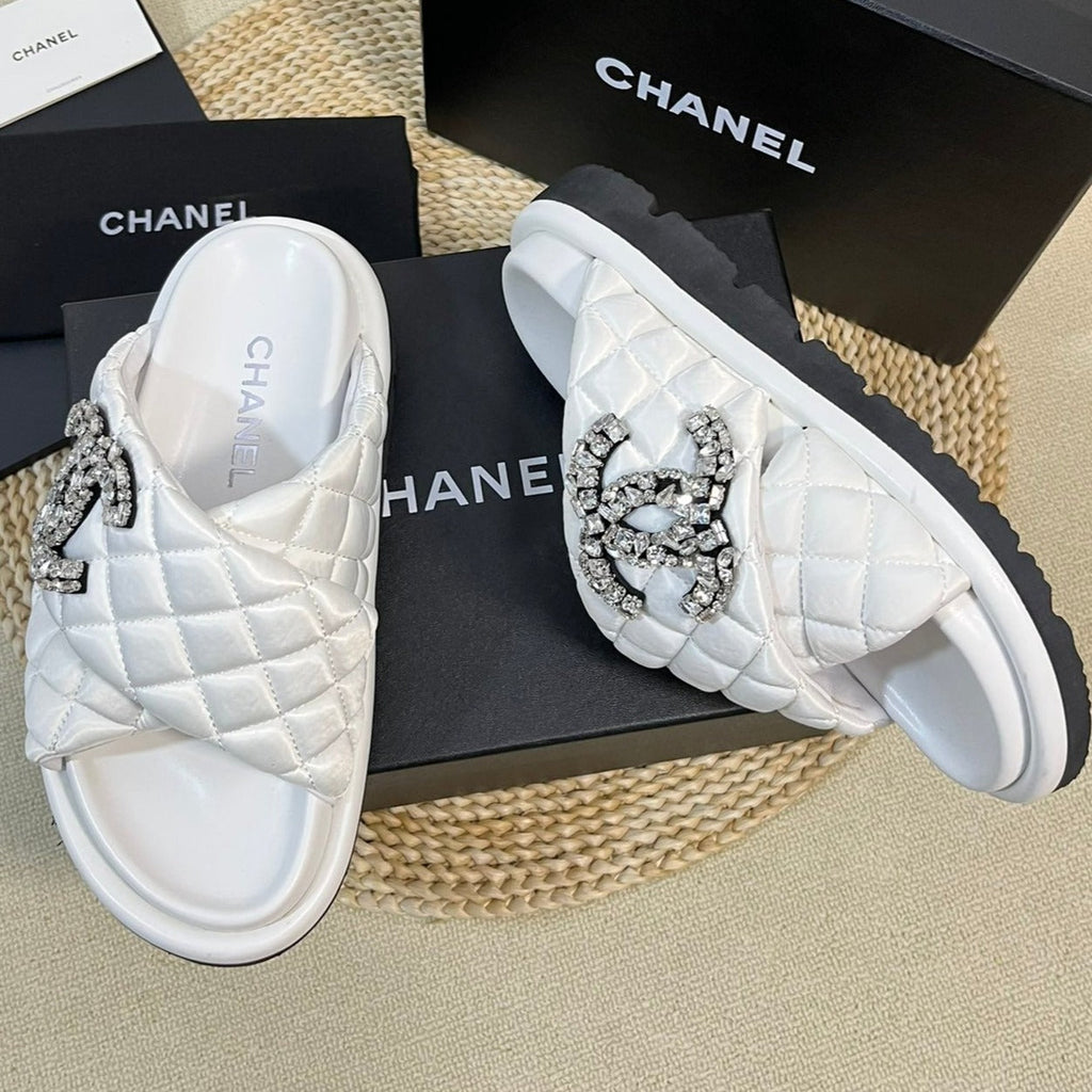 CHANEL Women's slippers with two crossed straps sheepskins white