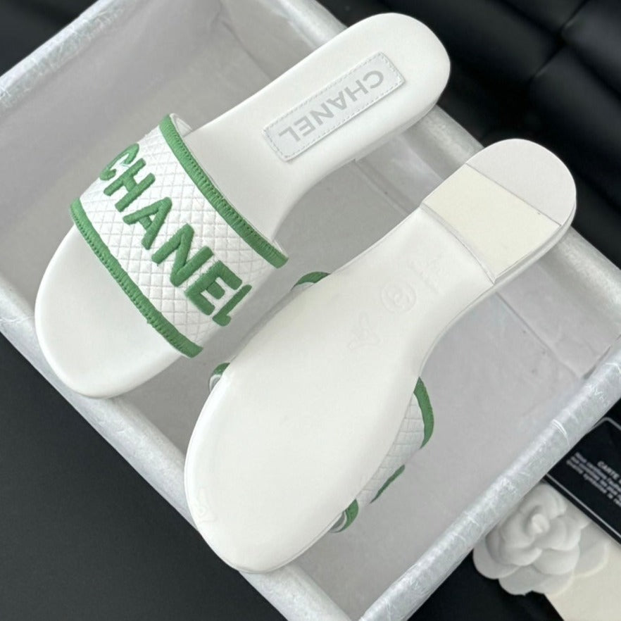 CHANEL Woven Embroidered Letter Slippers White Green