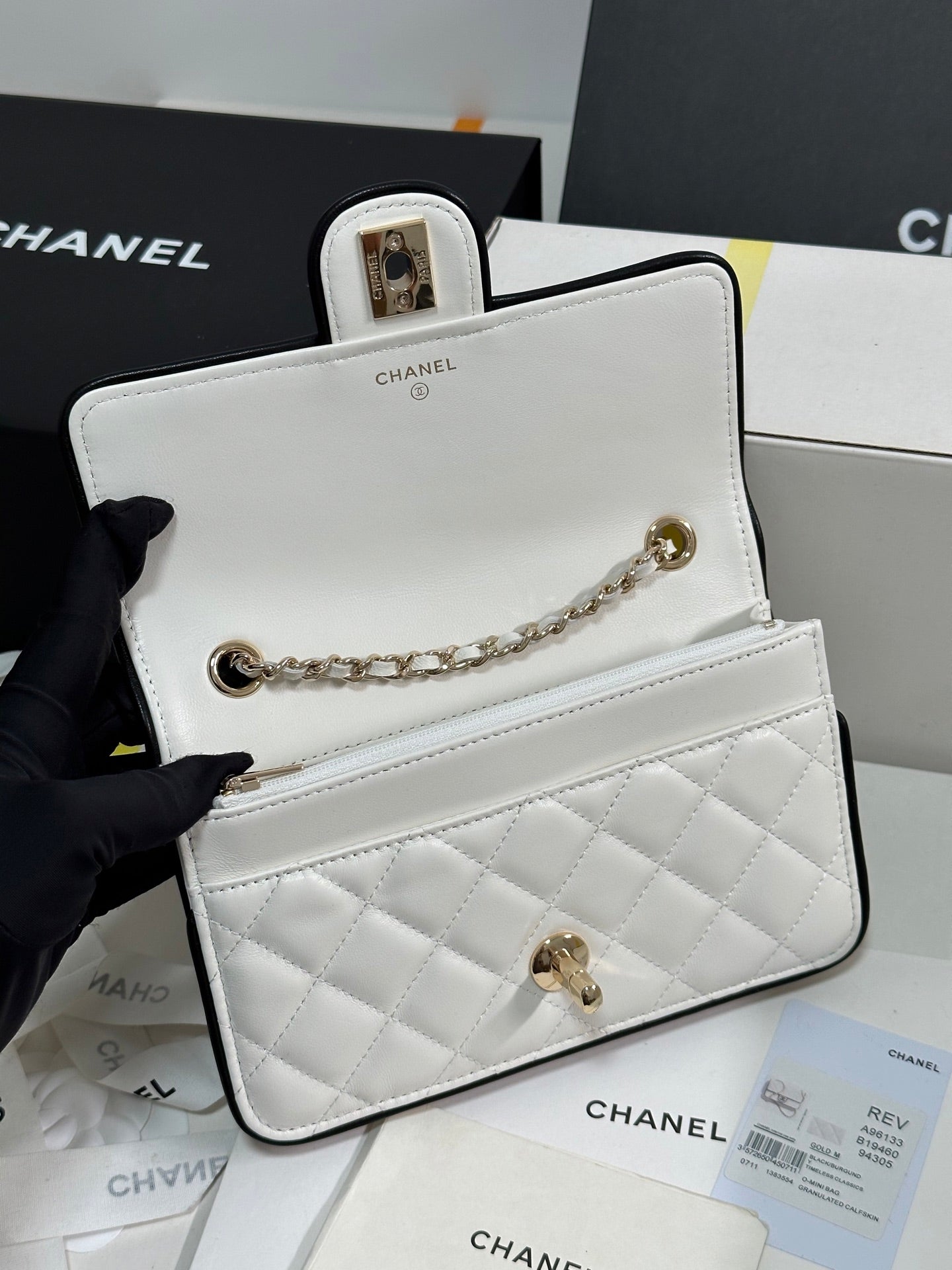 CHANEL QUILTED FLAP BAG WITH BLACK TRIM 19 IN WHITE LAMBSKIN