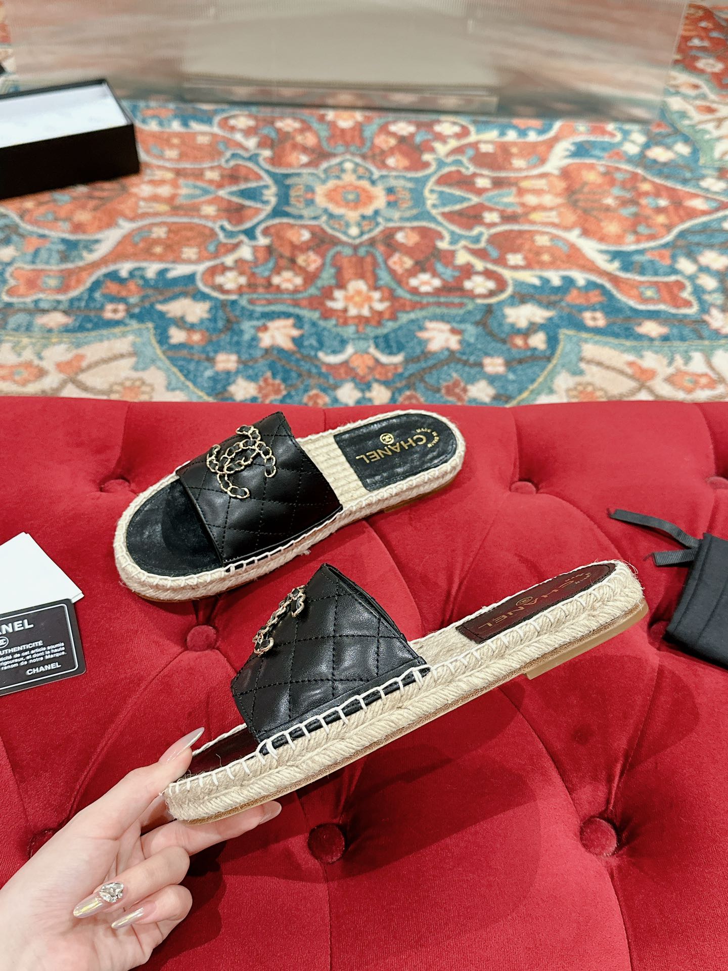 CHANEL FLAT SLIPPERS IN BLACK LAMBSKIN AND WOVEN WITH LOGO
