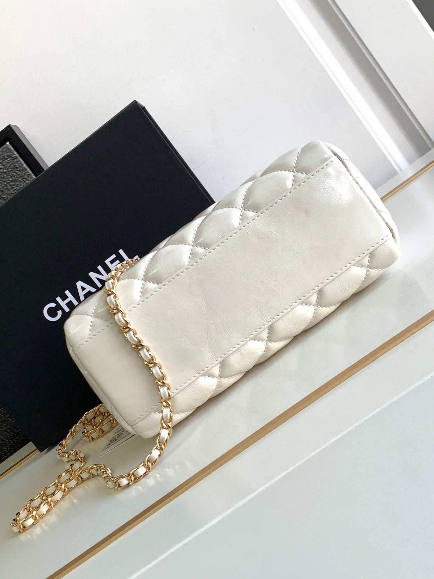 CHANEL CLASSIC MINI 20 CLUTCH WITH STRAP IN GLOSSY WHITE CALFSKIN