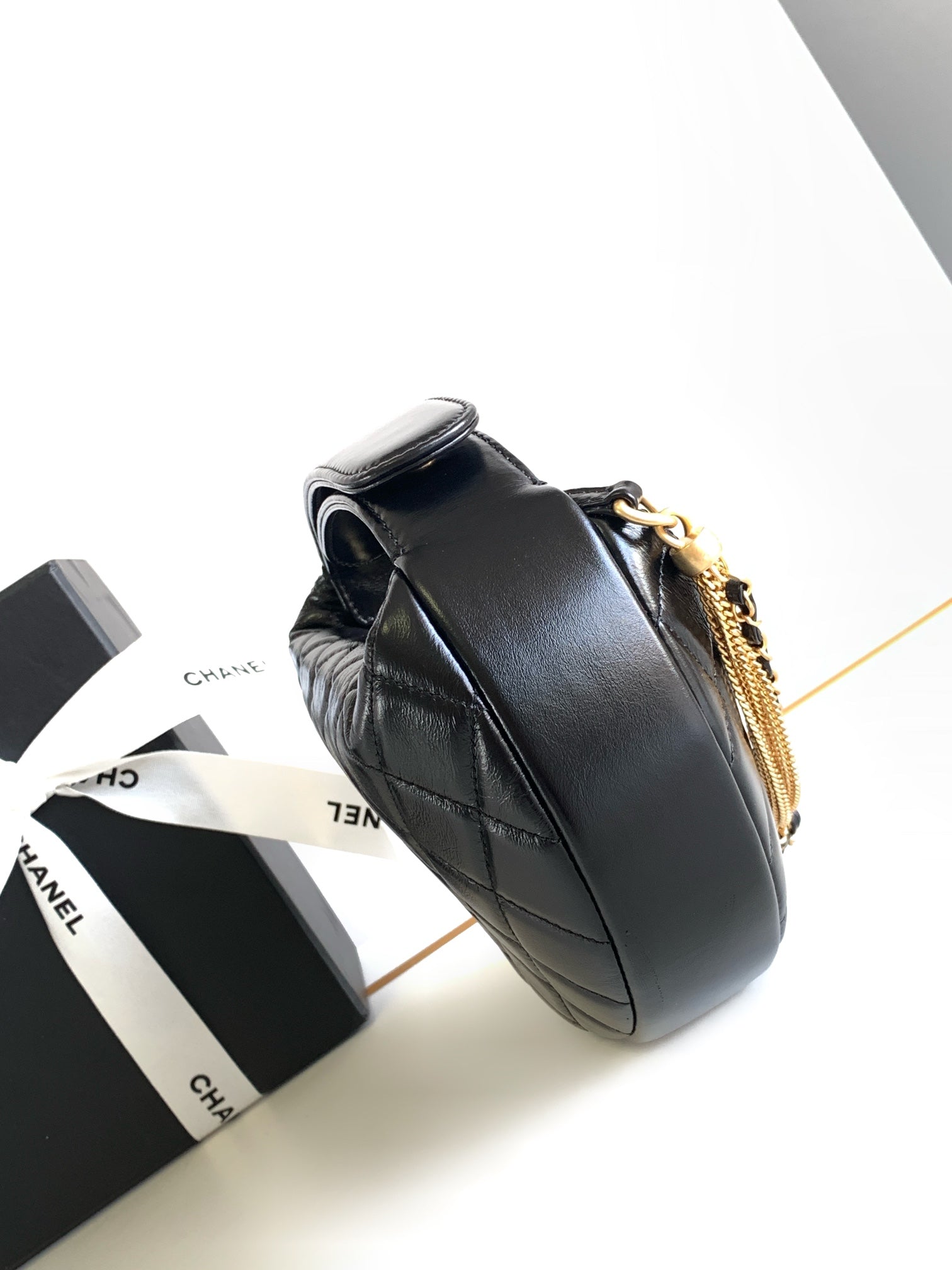 CHANEL 16 MINI POUCH IN BLACK GRAINED CALFSKIN AND GOLD METAL