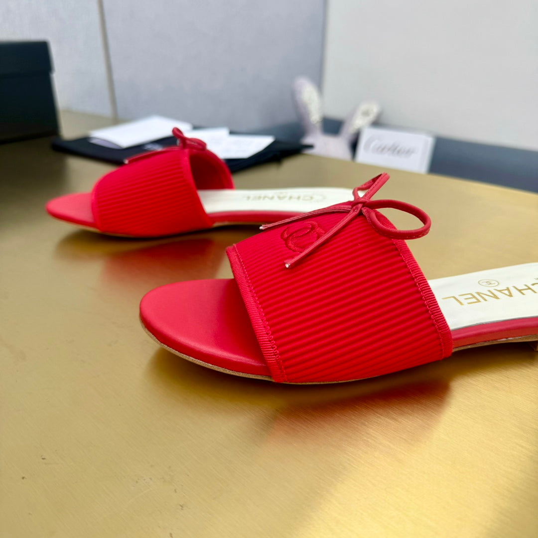 CHANEL BOW SLIPPERS IN CANDY RED LAMBSKIN