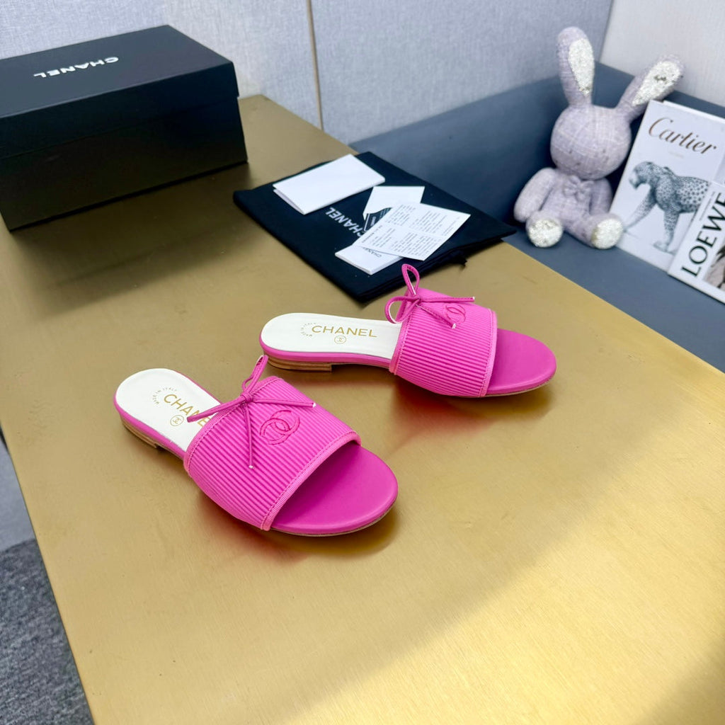 CHANEL BOW SLIPPERS IN BRIGHT PINK LAMBSKIN