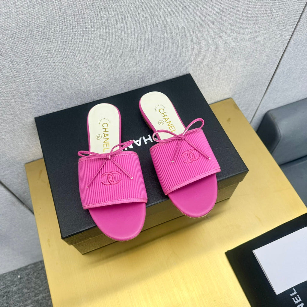 CHANEL BOW SLIPPERS IN BRIGHT PINK LAMBSKIN