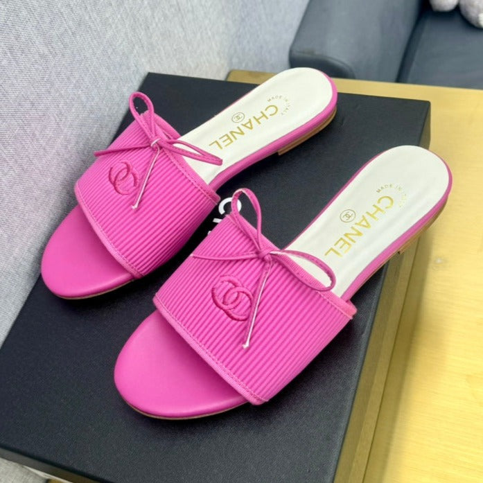 CHANEL BOW SLIPPERS IN BRIGHT PINK LAMBSKIN