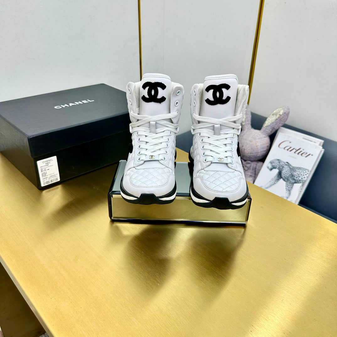 CHANEL ATHLETIC SHOES IN WHITE CALFSKIN