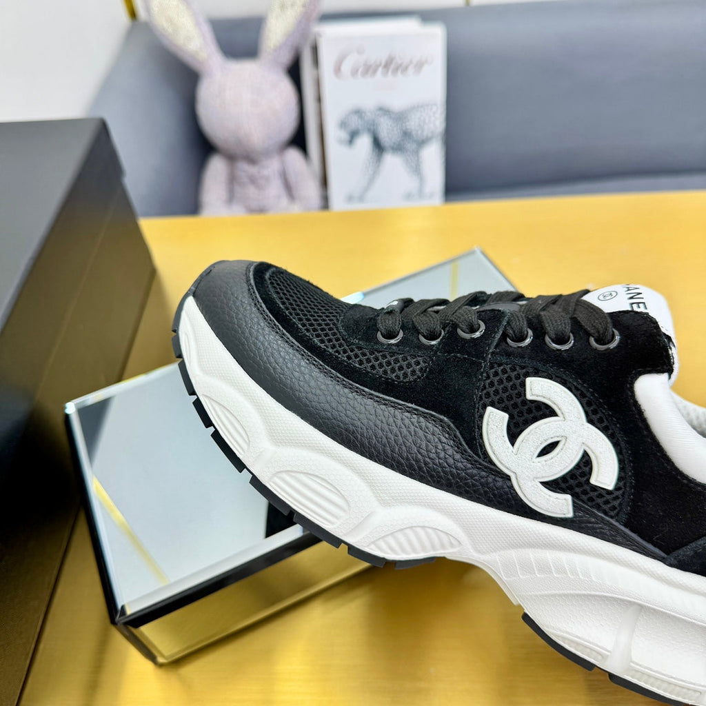 CHANEL SNEAKER IN BLACK WITH WHITE LOGO CALFSKIN AND MESH