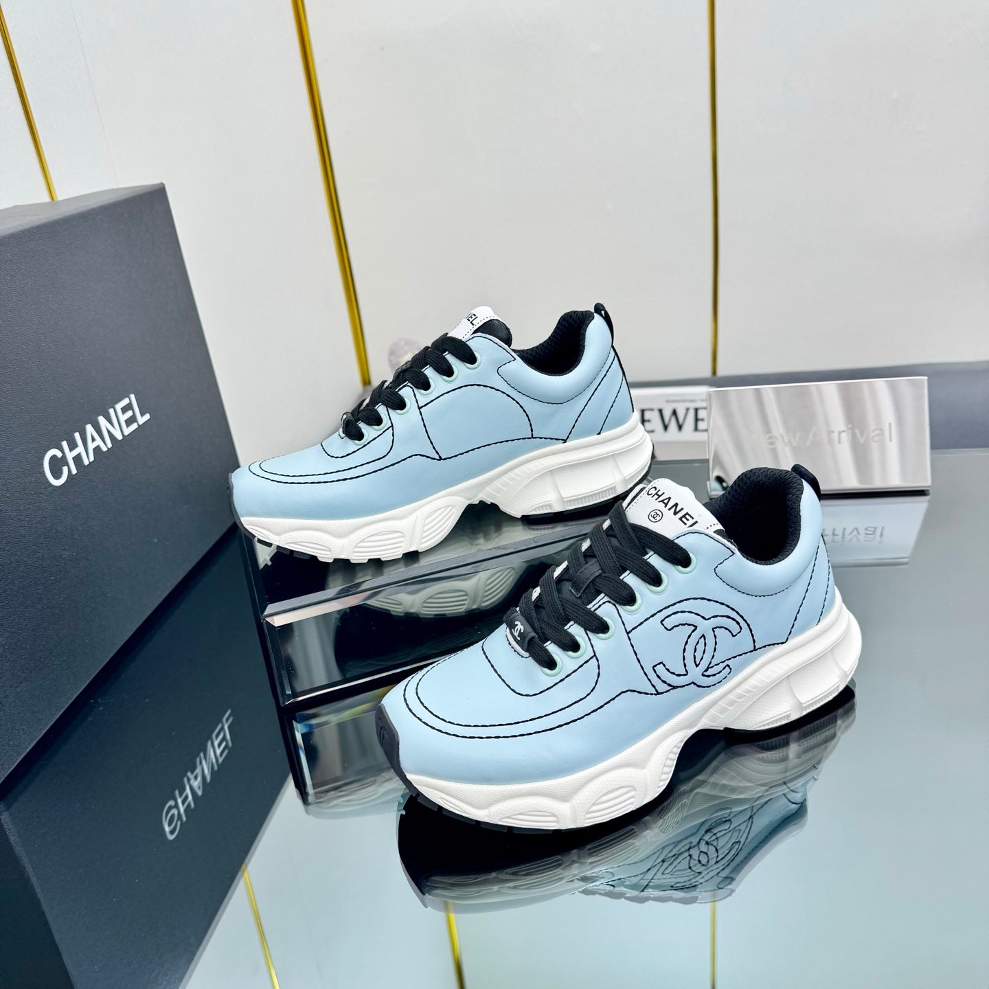 CHANEL TRAINERS SNEAKER IN LIGHT BLUE CALFSKIN WITH BLACK EMBROIDERED