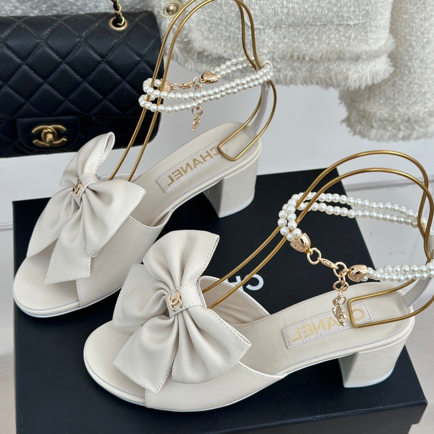 CHANEL Double C Big Bow Pearl Chain High Sandals White Lambskin