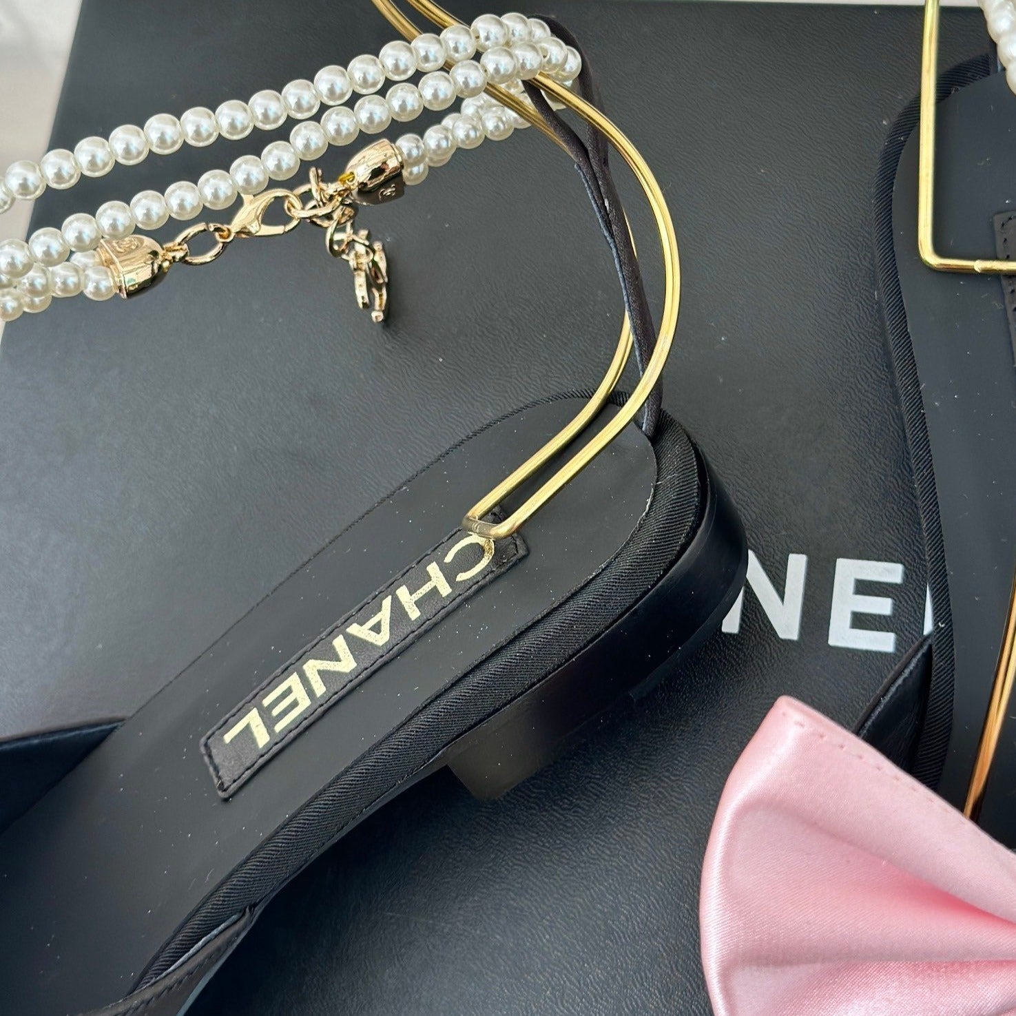 CHANEL Double C Big Bow Pearl Chain Sandals Light Pink Black Lambskin