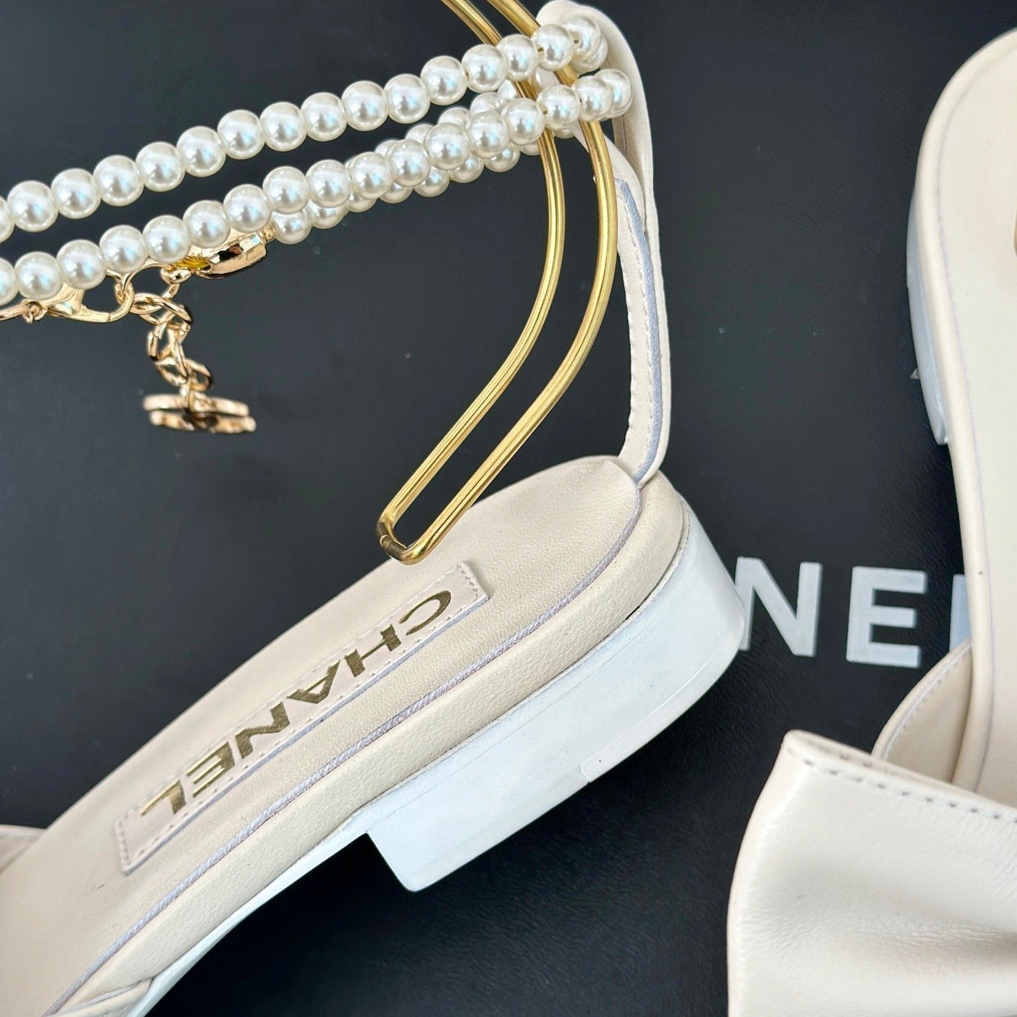 CHANEL Double C Big Bow Pearl Chain Sandals White Lambskin