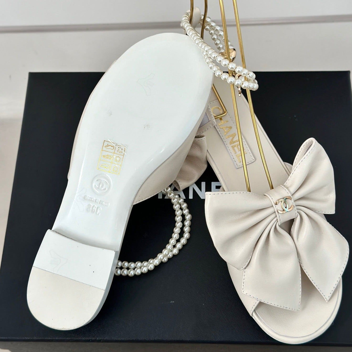 CHANEL Double C Big Bow Pearl Chain Sandals White Lambskin
