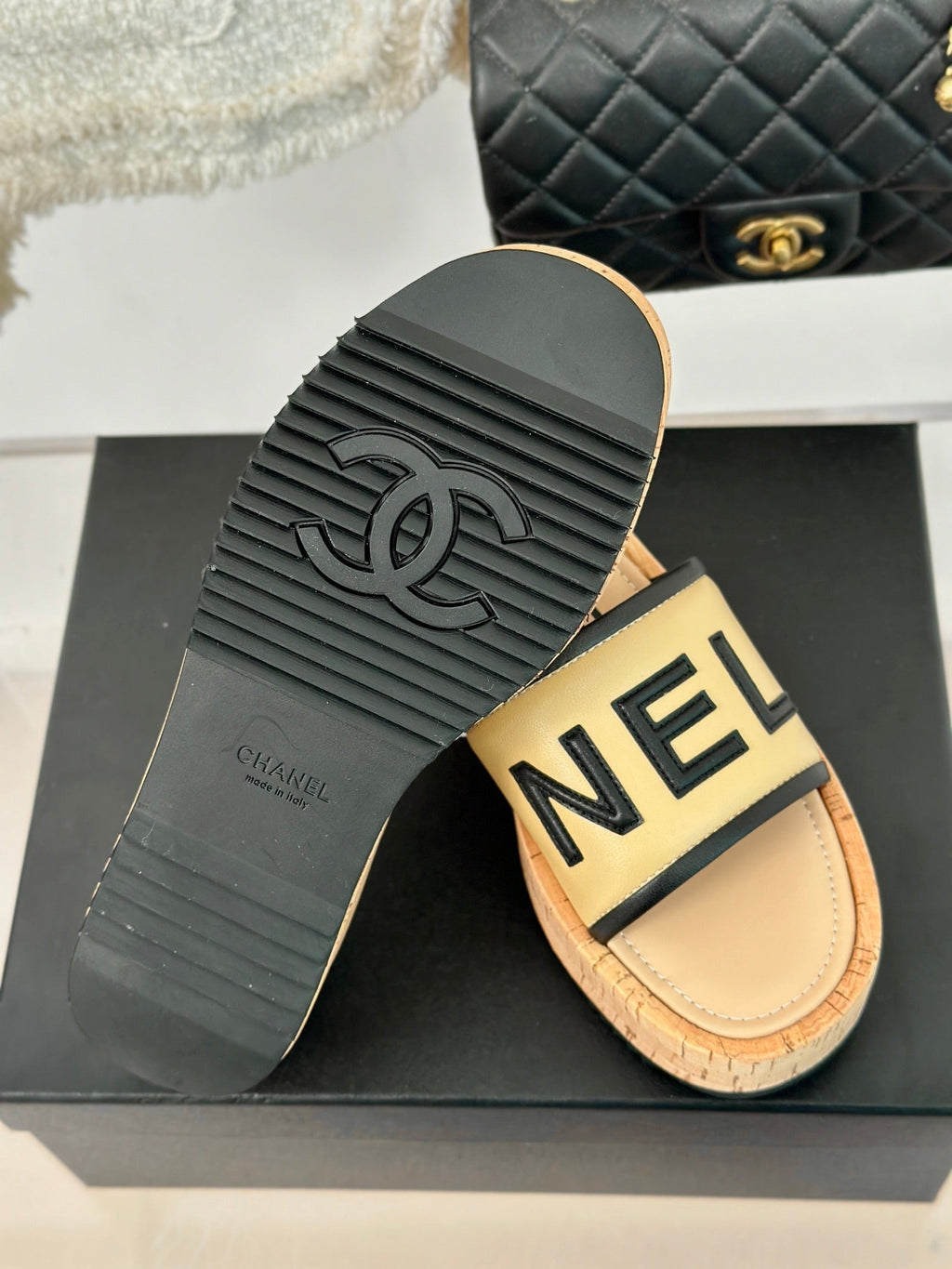 CHANEL THICK SOLE LETTER SLIPPERS IN DARK CREAM SHEEPSKIN