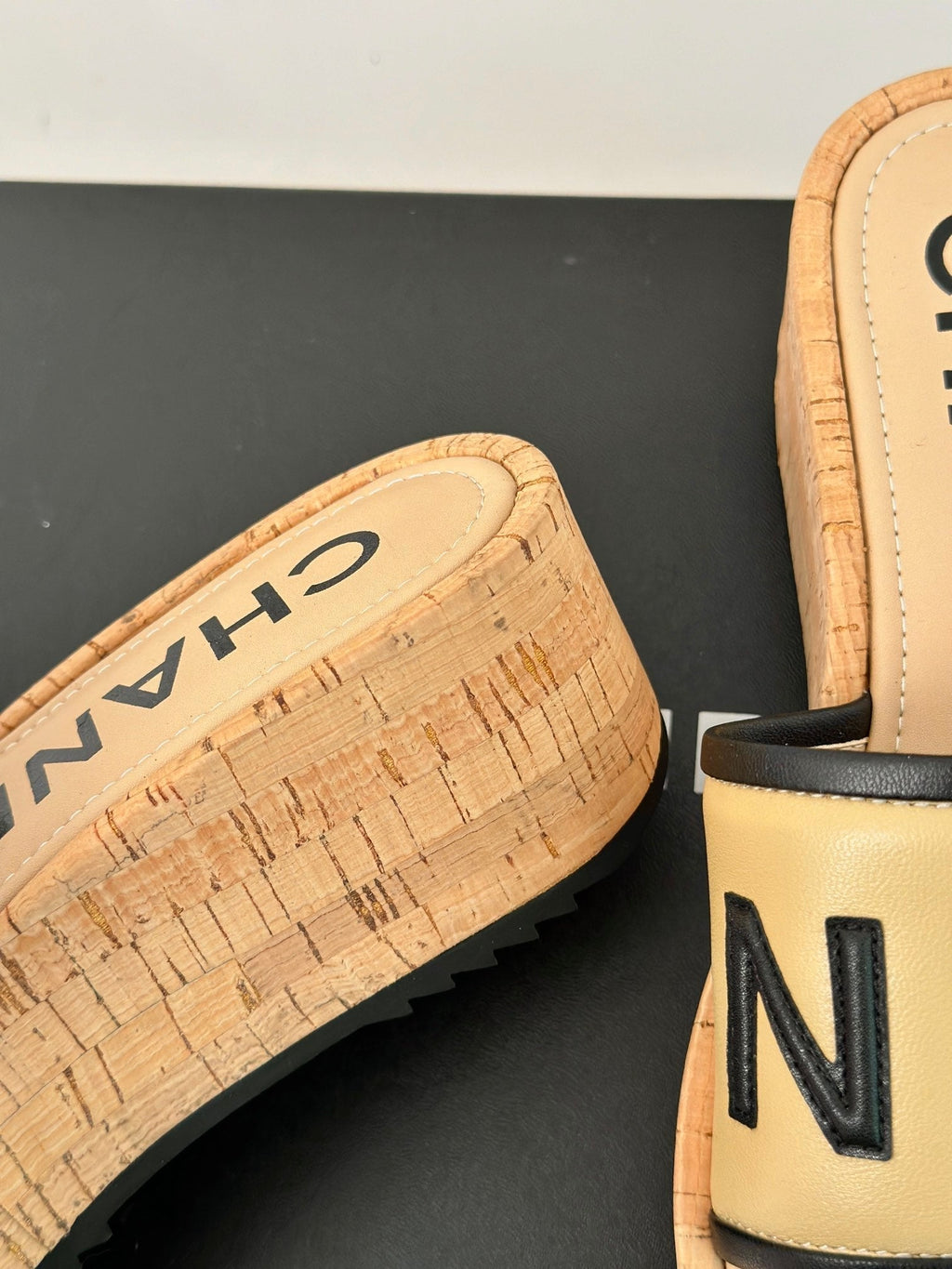CHANEL THICK SOLE LETTER SLIPPERS IN DARK CREAM SHEEPSKIN