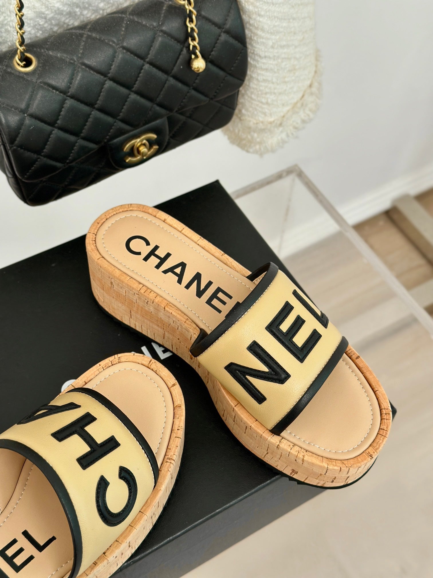 CHANEL THICK SOLE LETTER SLIPPERS IN DARK CREAM SHEEPSKIN