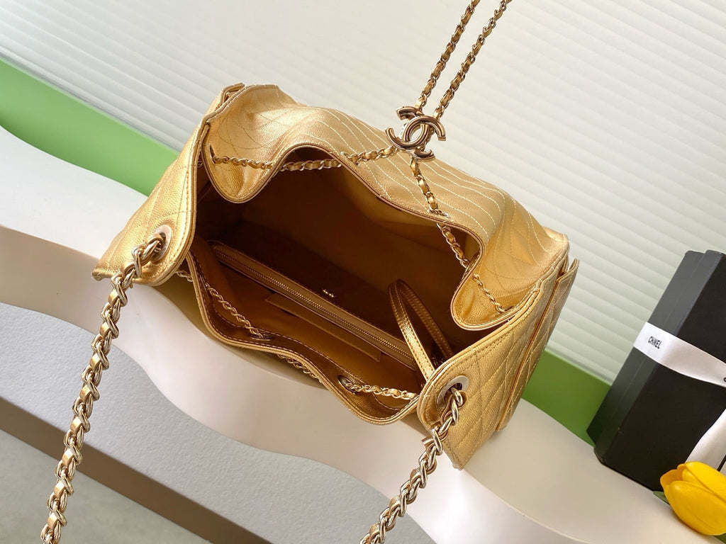 CHANEL 25S HOBO BAG 40 IN METALLIC GOLD CAVIAR LEATHER