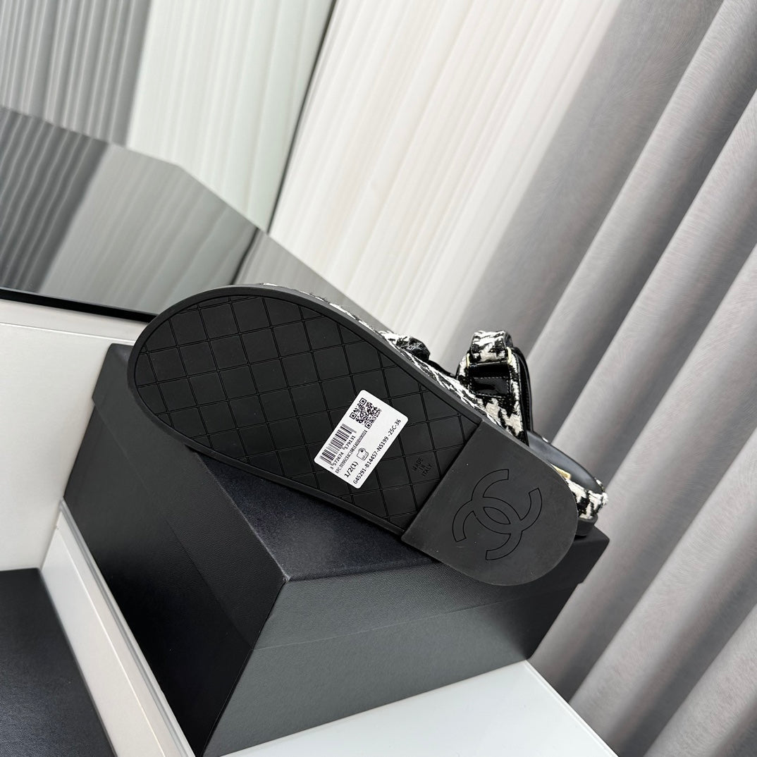 CHANEL dad sandals black white mules