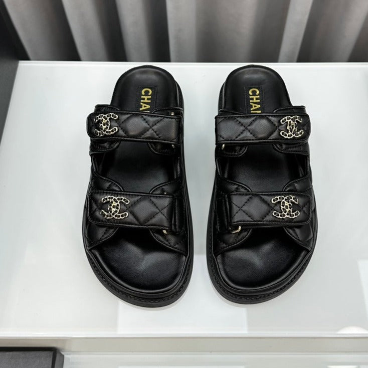 CHANEL dad sandals black lambskin mules
