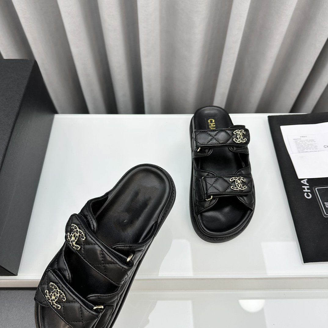 CHANEL dad sandals black lambskin mules