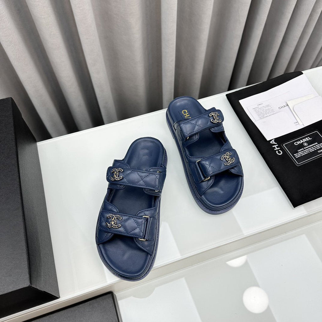 CHANEL dad sandals blue lambskin mules