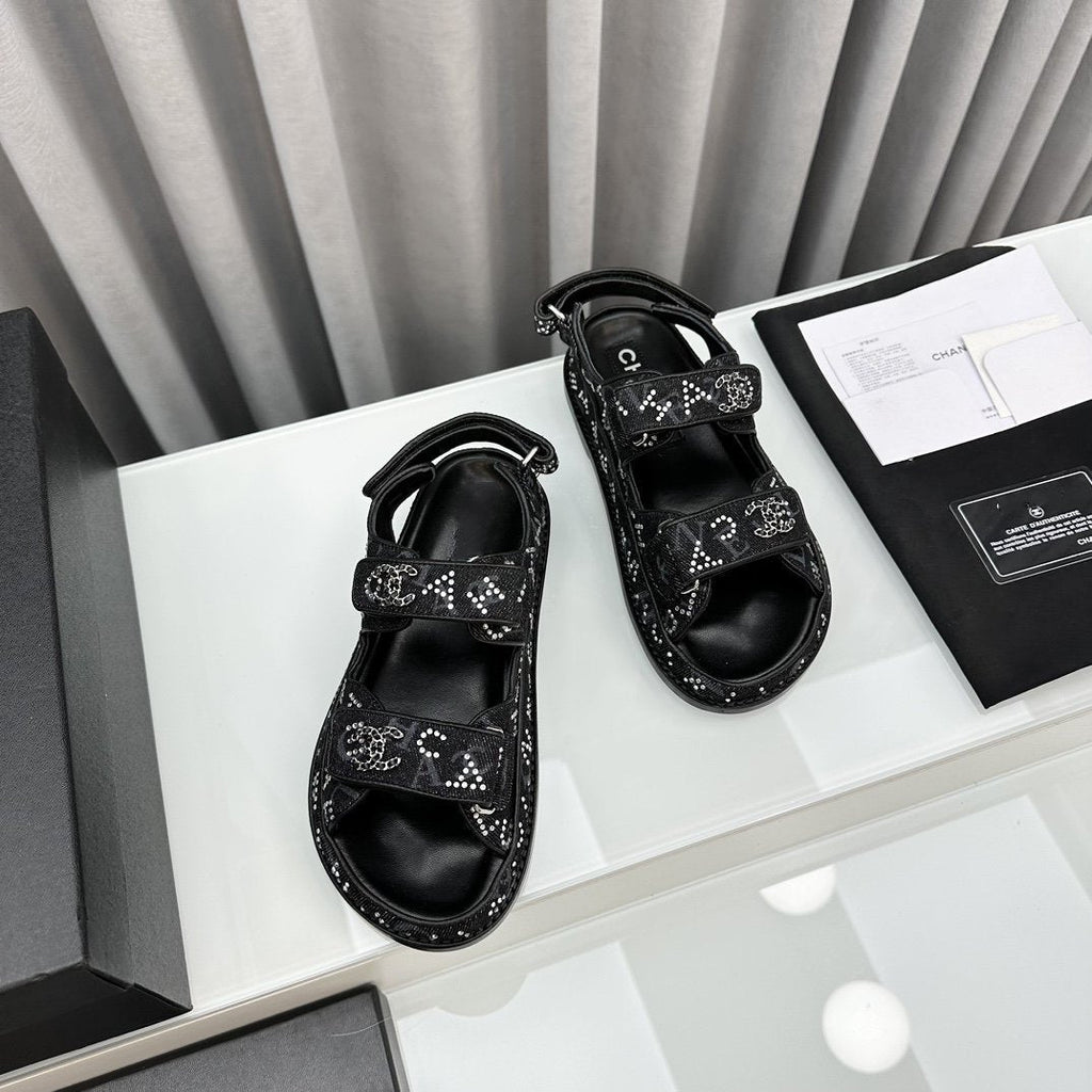 CHANEL dad sandals black denim mules