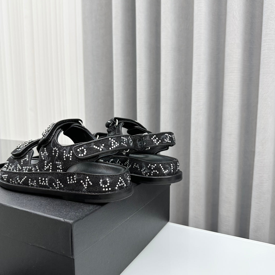 CHANEL dad sandals black denim mules