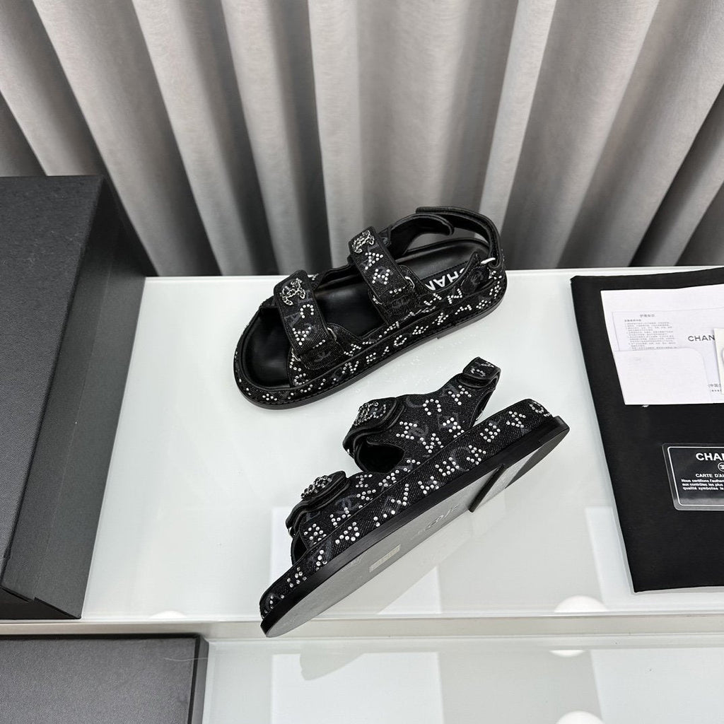 CHANEL dad sandals black denim mules