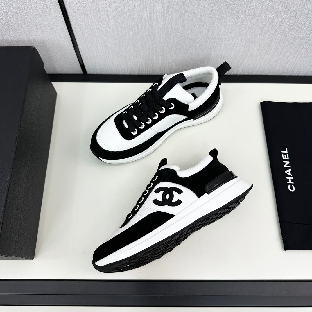 CHANEL SNEAKER IN BLACK SUEDE AND WHITE CALFSKIN