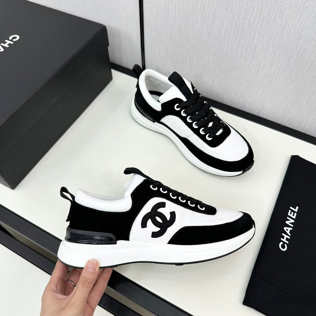 CHANEL SNEAKER IN BLACK SUEDE AND WHITE CALFSKIN