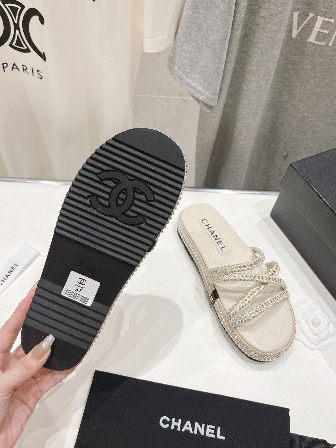 CHANEL WOVEN STRAP SLIPPERS IN WHITE LAMBSKIN