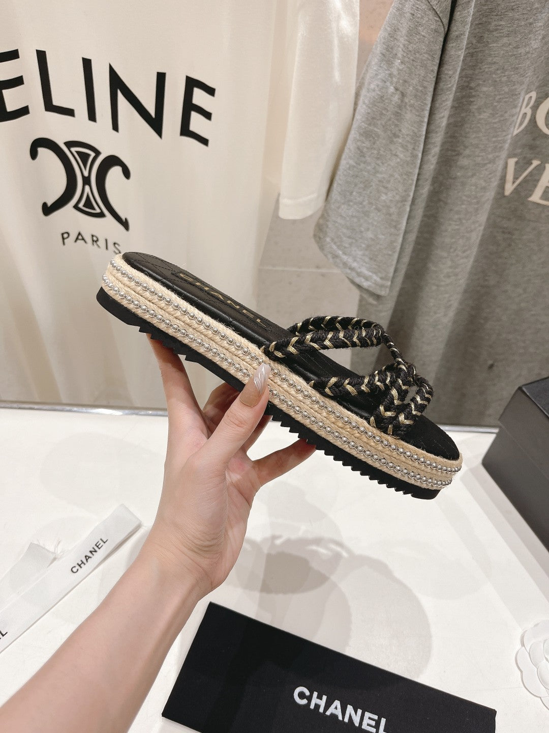 CHANEL WOVEN STRAP SLIPPERS IN BLACK LAMBSKIN