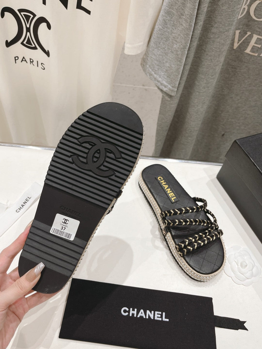 CHANEL WOVEN STRAP SLIPPERS IN BLACK LAMBSKIN