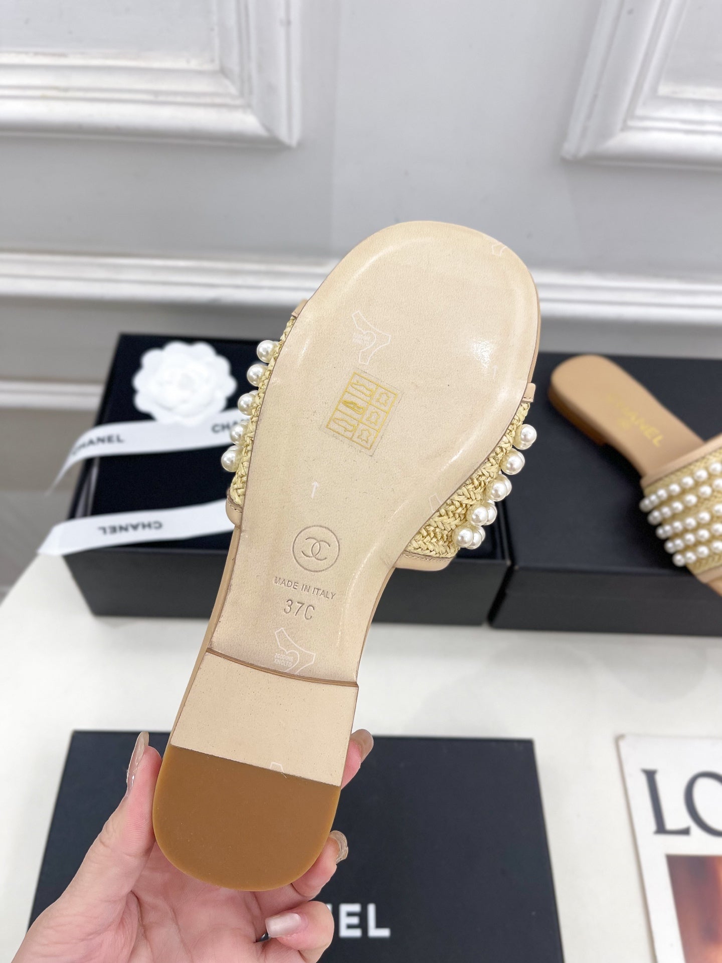 CHANEL FLAT SLIDE IN FLAX YELLOW CALFSKIN WITH PEARLS